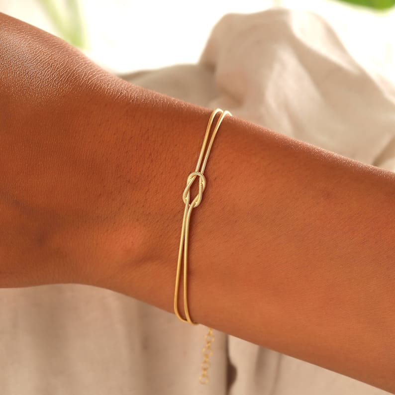 Armband Damer - Elegant Kärleksknop Design | Justerbar